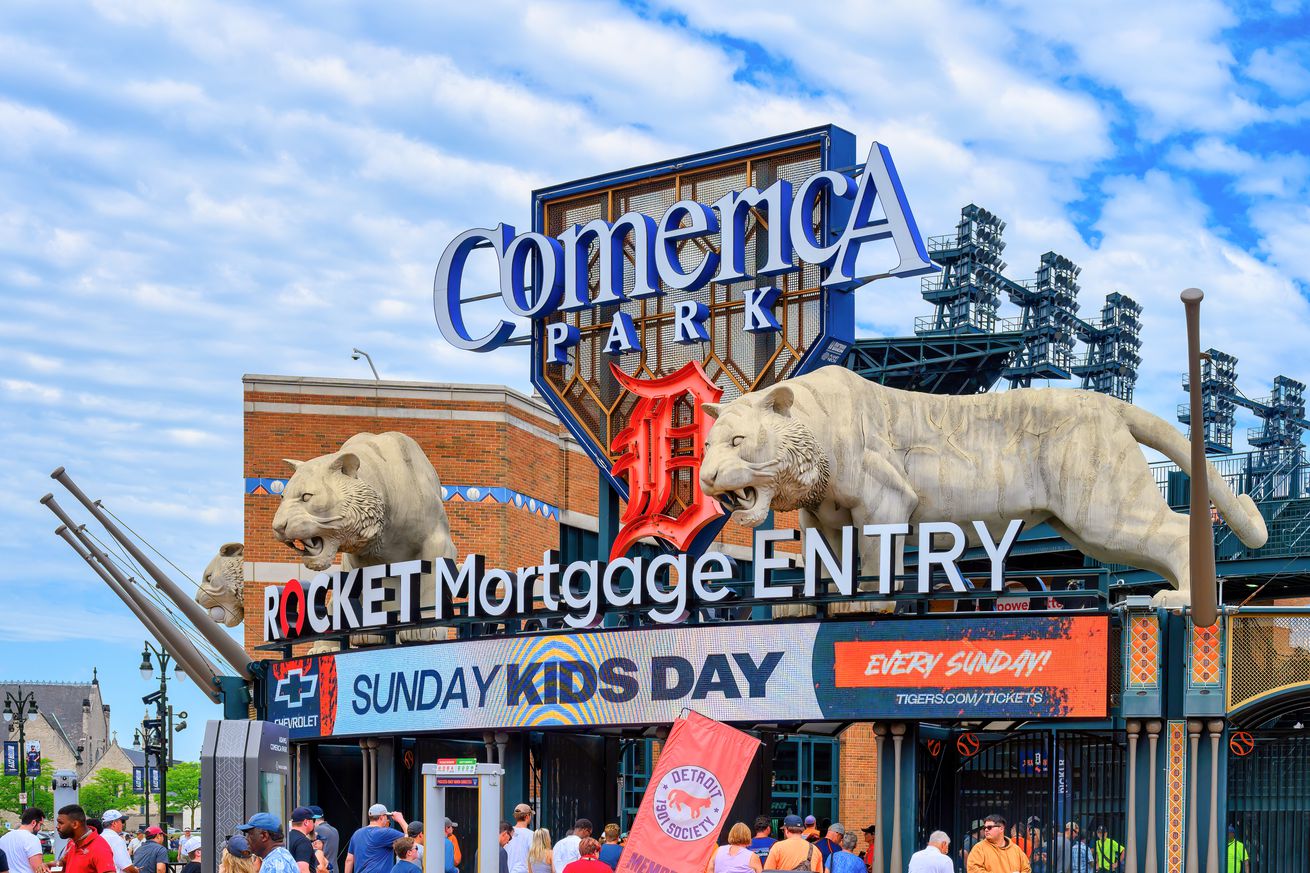 Entrance signs at the doors of Comerica Park, the home of...
