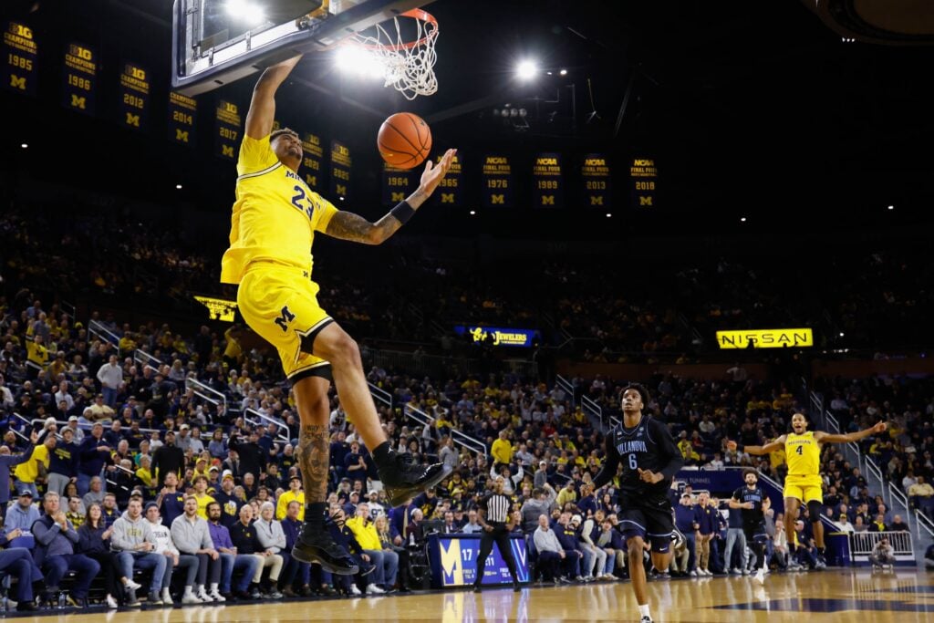  Michigan Wolverines forward Yaxel Lendeborg (23) dunks in the first half against the Villanova Wildcats at Crisler Center.